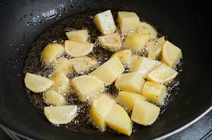 making patatas bravas